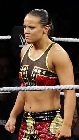 Who trained Shayna Baszler in mixed martial arts?