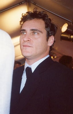 At what age did Joaquin Phoenix become a vegan?