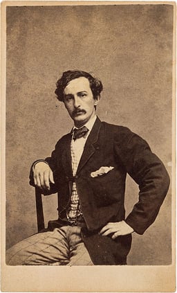What was John Wilkes Booth's profession before he became an assassin?