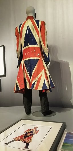 When was McQueen made a Commander of the British Empire?