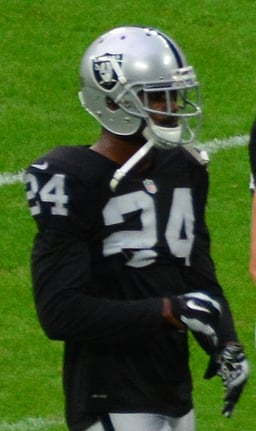 What position did Charles Woodson play in the NFL?
