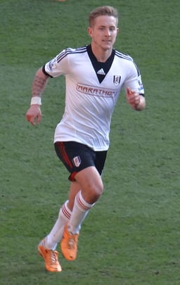 In which club did Lewis Holtby make over 100 appearances?