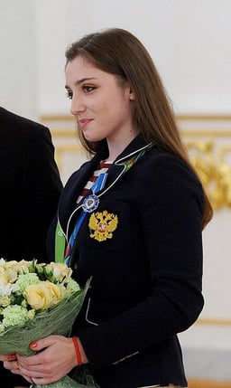 Has Mustafina ever won a medal in team competition?