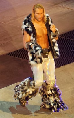 What is the signature pose that Tyler Breeze is known for during his entrance?