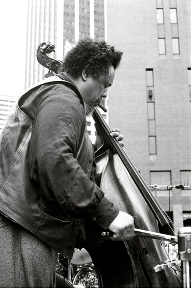Which style of jazz is Mingus particularly noted for advancing?
