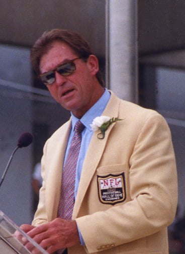 What year did Jack Youngblood start working with the Arena Football League?