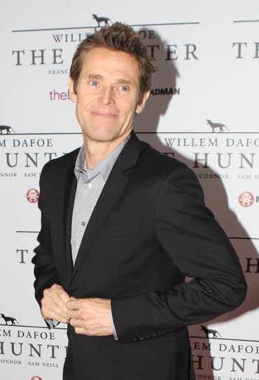 In which film did Dafoe play a frequent guest at a motel?
