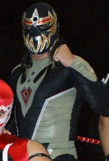 At one time, how many CMLL championships did Dorada hold at the same time?