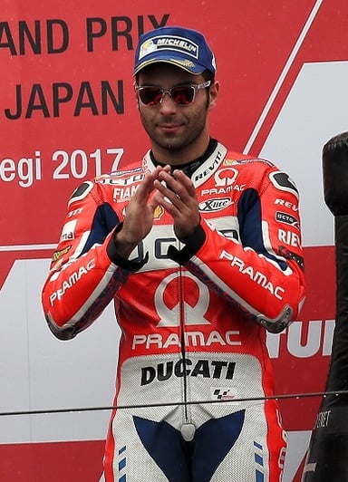 With which team did Danilo Petrucci win his first MotoGP race?