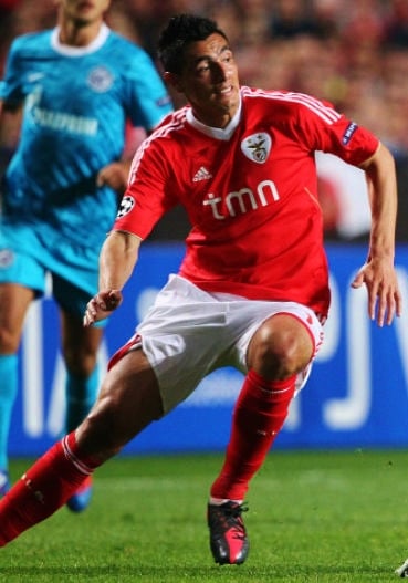 In which year did Cardozo win the national championship with Benfica?