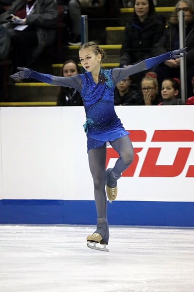At which event did Trusova first land two ratified quads in a free skate?