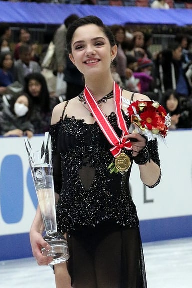 What score did Evgenia first exceed in free skating?