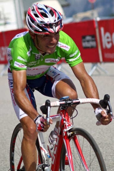 As of 2016, how many Vuelta a España has Rodríguez podiumed in?