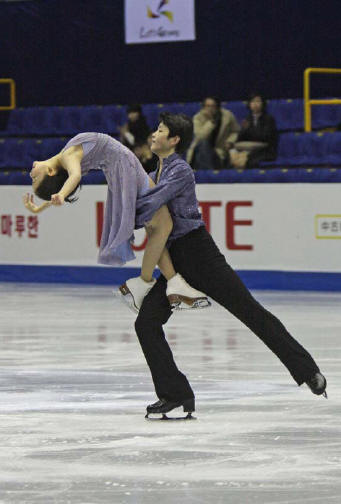 In addition to ice dancing, what other type of skating did Alex compete in?
