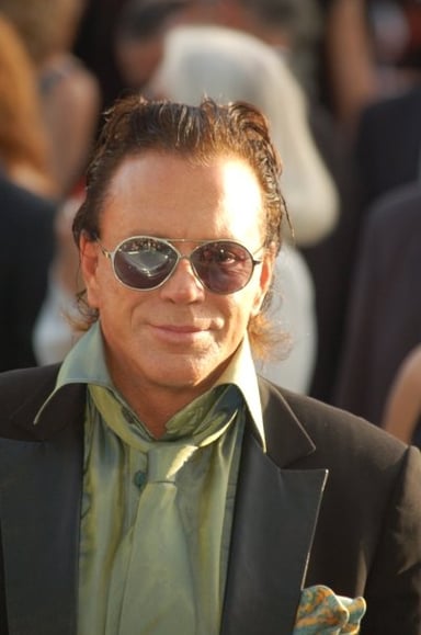 Which horror mystery film did Mickey Rourke receive critical praise for his work in?