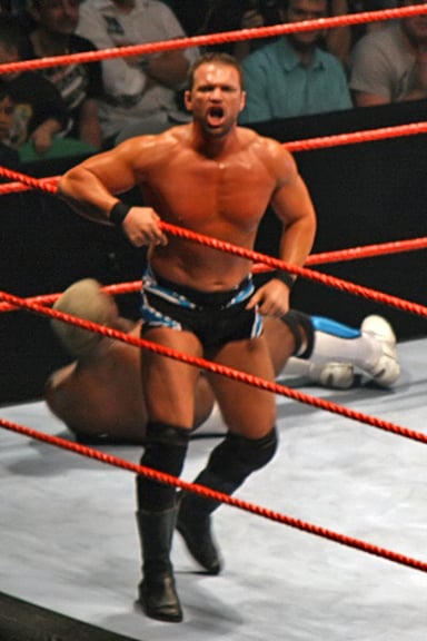With whom did Charlie Haas form a short-lived tag team in WWE in 2006?