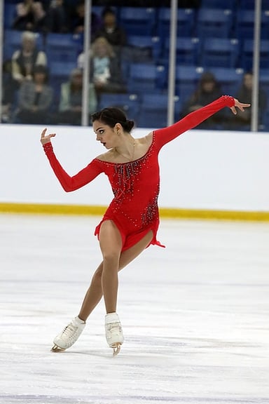 Who outpaced Evgenia as a historic female figure skater before her?