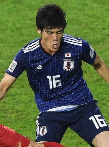 When did Tomiyasu make his debut for Japan's senior team?