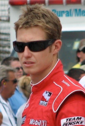In which year did Ryan Briscoe win the Petit Le Mans for the first time?