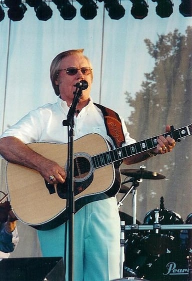 What year did George Jones get divorced from his first wife?