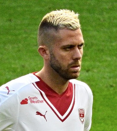 In what year did Ménez make his Ligue 1 debut?