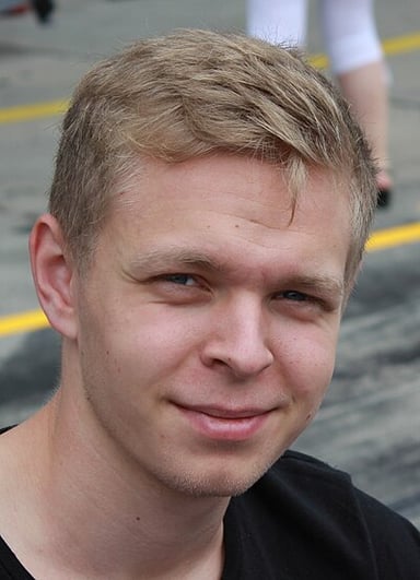 When did Kevin Magnussen join the McLaren's Young Driver Program?