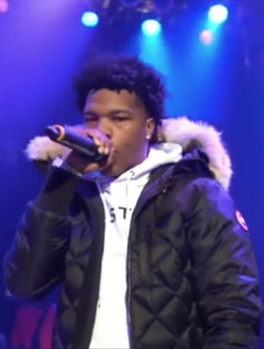 Who collaborated with Lil Baby on "Drip Harder"?