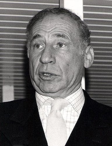 Which of Mel Brooks' films is a musical adaptation of his first film?