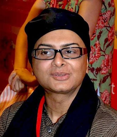What degree did Rituparno Ghosh pursue in his studies?