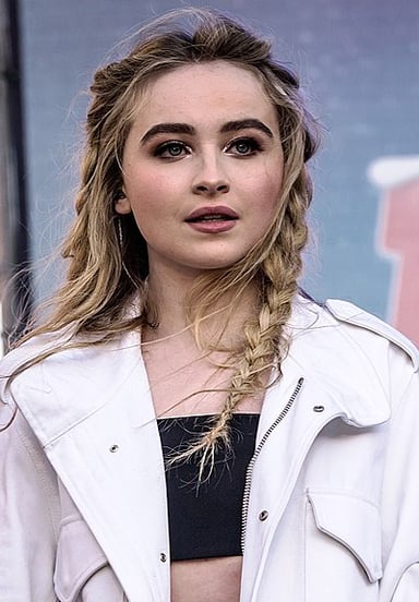 Which song was Sabrina's first to chart on Billboard Hot 100?