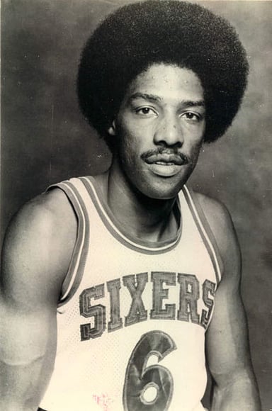 How many scoring titles did Julius Erving win?