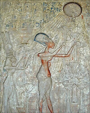What was the name of the new capital city Akhenaten built for the worship of Aten?
