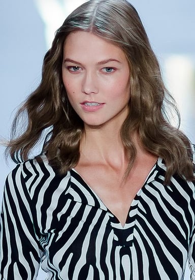At what age was Karlie declared one of the "top 30 models of the 2000s"?