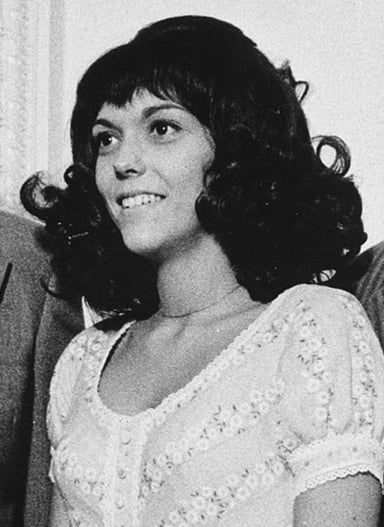 How old was Karen Carpenter when the Carpenters signed their first record deal?