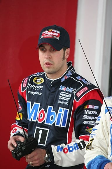 When did Sam Hornish Jr. start his top-tier racing career?