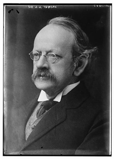 What type of rays did J.J. Thomson use in his experiments to discover the electron?