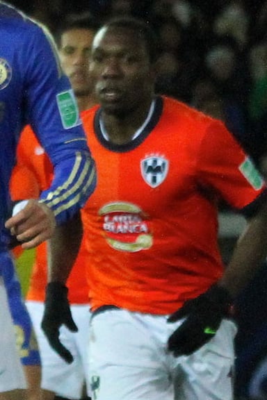 Which Ecuadorian football club did Walter Ayoví play for before joining the Monterrey Flash?