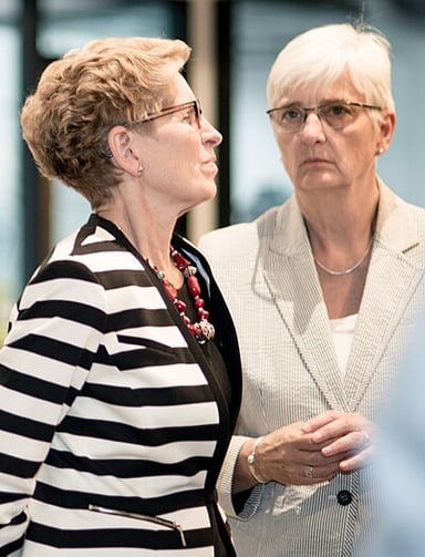 Kathleen Wynne's government introduced free tuition for families earning under what amount?
