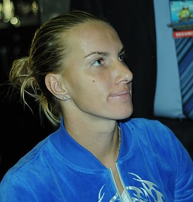 Who was Kuznetsova's partner for her doubles title at the 2005 Australian Open?