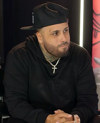 Who did Nicky Jam collaborate with on the hit song "X"?
