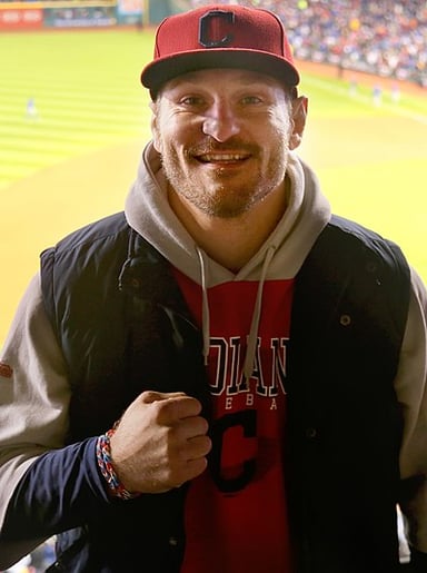 Which university did Stipe Miocic wrestle for in NCAA Division I?
