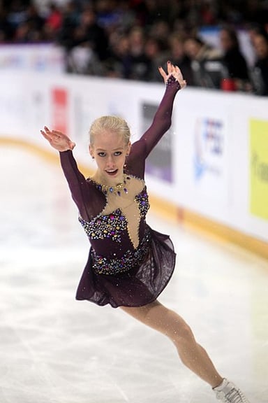 What is the name of Bradie Tennell's first skating coach?