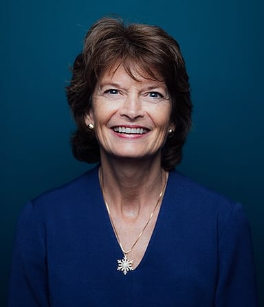 Which President's position did Lisa Murkowski vote with 72.3% of the time in 2013?