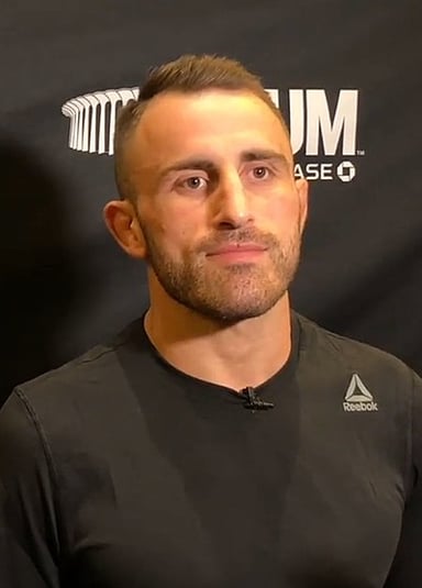 Which country did Alexander Volkanovski represent in the 2015 IMMAF World Championships?