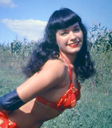 In 1959, what religion did Bettie Page convert to?