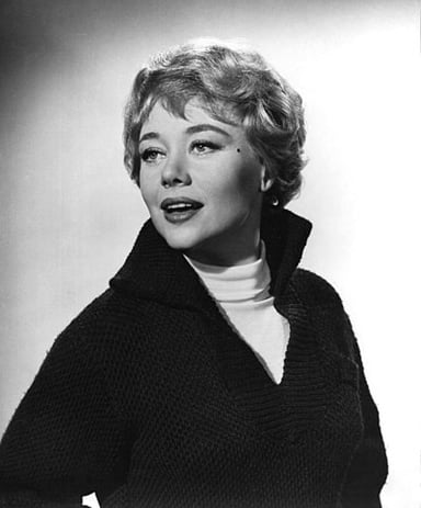 What is notable about Glynis Johns' voice, as mentioned in the text?