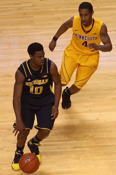 What college did Derrick Walton play for?