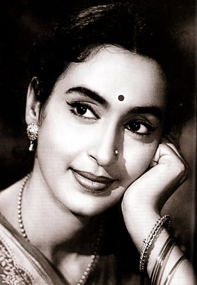 Which film did Nutan and Dev Anand work together in?