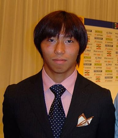 What position did Hisato Satō play in football?