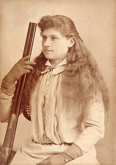 What was the name of the stage musical adapted from Annie Oakley's story?